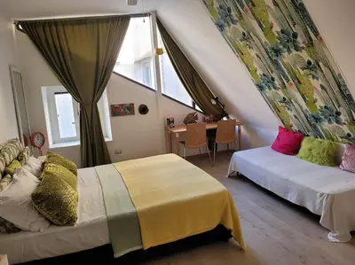 Letto o letti in una camera di Apartment in the historical center with panoramic terrace