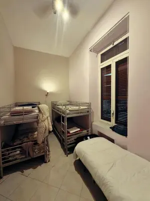 Letto o letti in una camera di Naples Pizza Hostel