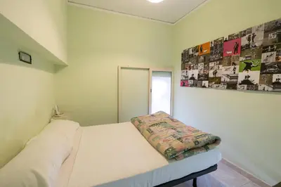 Letto o letti in una camera di Naples Pizza Hostel