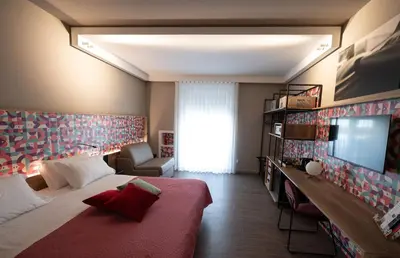 Letto o letti in una camera di Bed In Centro