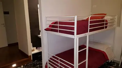 Letto o letti in una camera di B&B Rettifilo