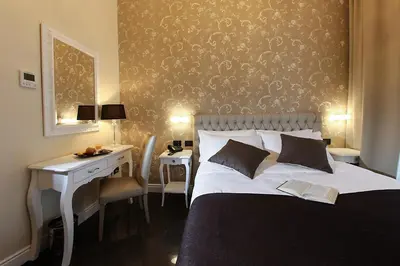 Letto o letti in una camera di Villa San Martino