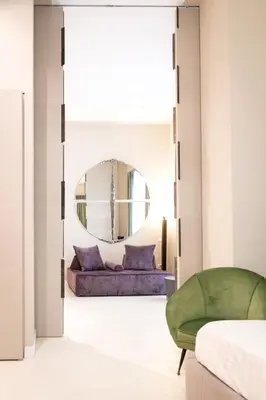 Letto o letti in una camera di Atelier Inès Arts & Suites