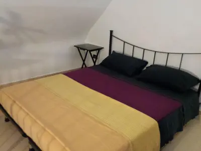 Letto o letti in una camera di Appartamento Valentina e Viviana