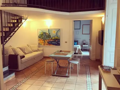 Area soggiorno di Gallery Bellini Apartment