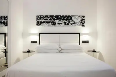 Letto o letti in una camera di LHP Suite Napoli Parco Margherita
