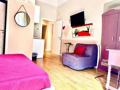 TV o dispositivi per l'intrattenimento presso Corso 211 Beds & Suites