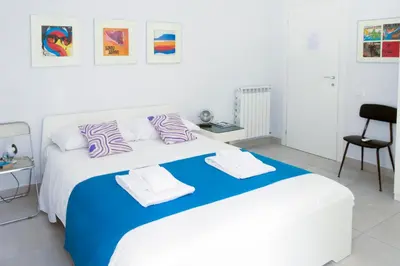 Letto o letti in una camera di Interno16HolidayHome