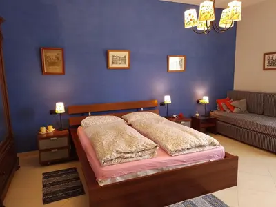 Letto o letti in una camera di b&b Cupole e Campanili