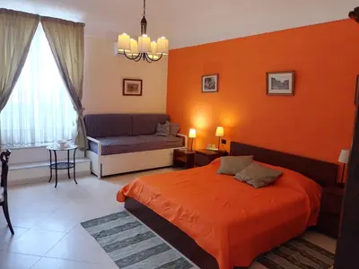 Letto o letti in una camera di b&b Cupole e Campanili