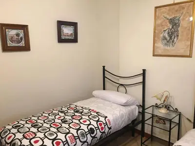 Letto o letti in una camera di Napoli Charming Apartments Salvator Rosa 