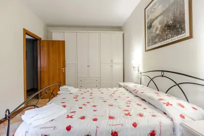 Letto o letti in una camera di Napoli Charming Apartments Salvator Rosa 