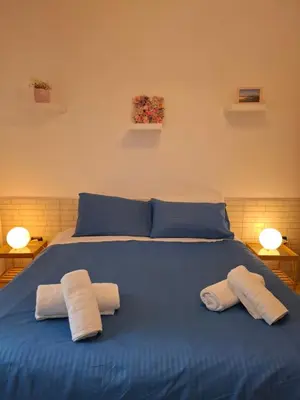 Letto o letti in una camera di Dimora Filangieri