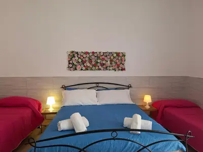 Letto o letti in una camera di Dimora Filangieri