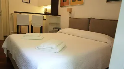 Letto o letti in una camera di Luca Giordano 142 B&B