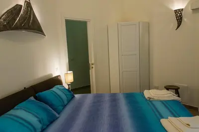 Letto o letti in una camera di B&B Univercity