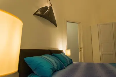 Letto o letti in una camera di B&B Univercity
