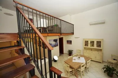 Area soggiorno di Italia Apartment