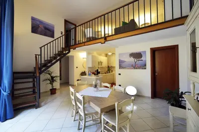 Area soggiorno di Italia Apartment
