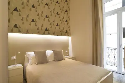 Letto o letti in una camera di B&B EMME21