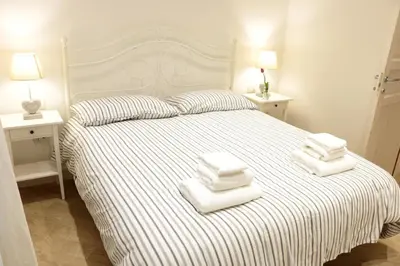Letto o letti in una camera di La Scalinata di Chiaia