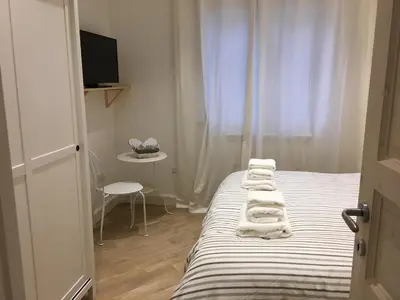 Letto o letti in una camera di La Scalinata di Chiaia