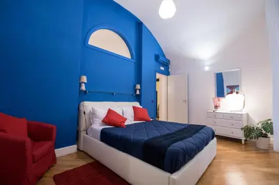 Letto o letti in una camera di Casa Le Volte