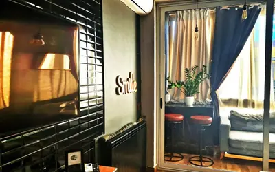 Area soggiorno di Munì Boutique Flat by Babylon Stay
