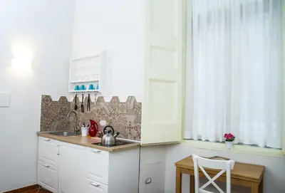 Cucina o angolo cottura di Domus Donnaregina Apartments