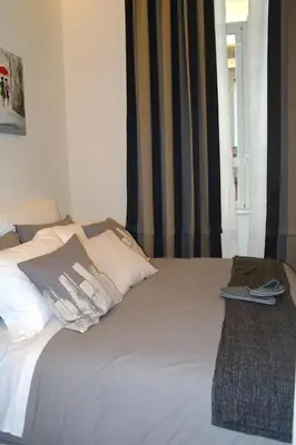 Letto o letti in una camera di B&B Chiaia 216