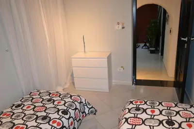 Letto o letti in una camera di HomeNapoli