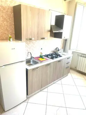 Cucina o angolo cottura di Miseria e Nobiltà Apartment CHECK-IN FROM 12 00 TO 15 00