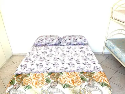 Letto o letti in una camera di Miseria e Nobiltà Apartment CHECK-IN FROM 12 00 TO 15 00