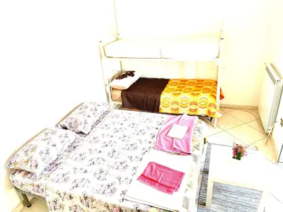 Letto o letti in una camera di Miseria e Nobiltà Apartment CHECK-IN FROM 12 00 TO 15 00