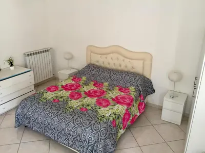 Letto o letti in una camera di Miseria e Nobiltà Apartment CHECK-IN FROM 12 00 TO 15 00