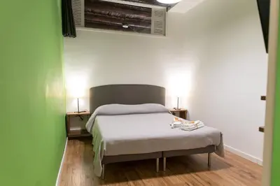 Letto o letti in una camera di Sleep & Zupp Casa Olimpia