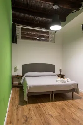 Letto o letti in una camera di Sleep & Zupp Casa Olimpia