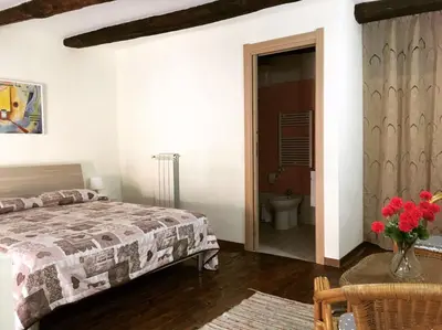 Letto o letti in una camera di Vertecoeli Home