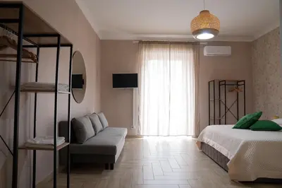Letto o letti in una camera di B&B Caracciolo 109
