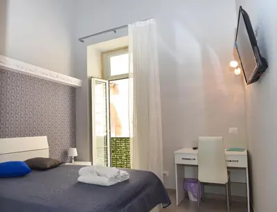 Letto o letti in una camera di Famigi