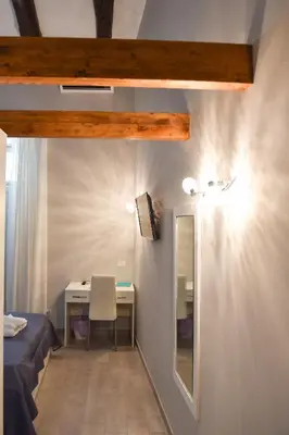 Letto o letti in una camera di Famigi