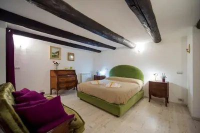 Letto o letti in una camera di La Regina di Vertecoeli