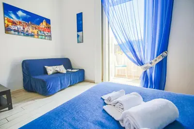 Letto o letti in una camera di Bed & Breakfast Piazza Dante