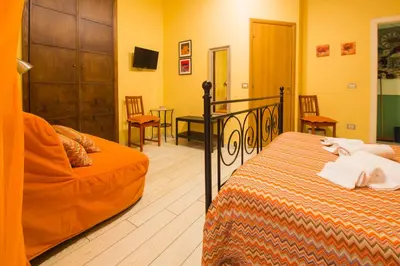 Letto o letti in una camera di Bed & Breakfast Piazza Dante