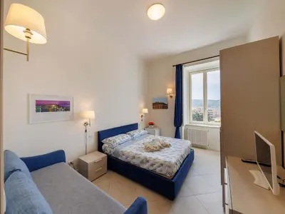 Letto o letti in una camera di B&B La Certosa di San Martino