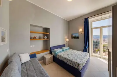 Letto o letti in una camera di B&B La Certosa di San Martino