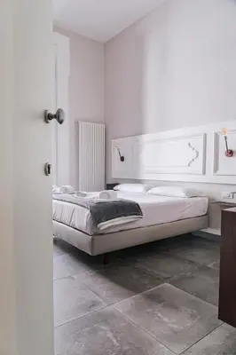 Letto o letti in una camera di La Smorfia
