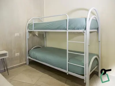 Letto o letti in una camera di Hotiday Spaccanapoli I Borbone