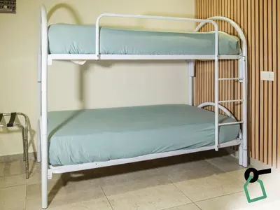 Letto o letti in una camera di Hotiday Spaccanapoli I Borbone