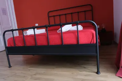 Letto o letti in una camera di B&B Tarumbò